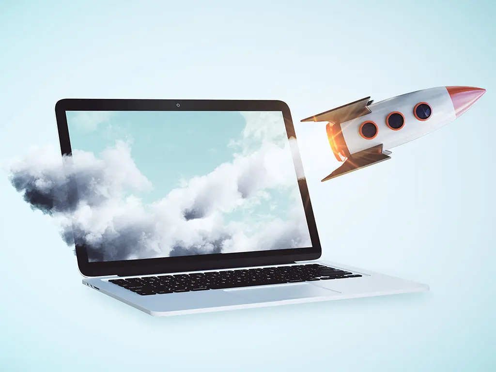 Laptop with a rocket | AX Digital